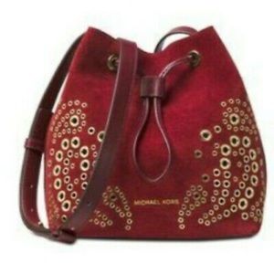 Michael Kors Cary Handbag. Cranberry color with gold embellishments and Satchel.